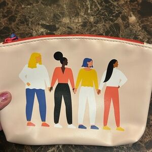 Ipsy tan make up bag featuring diverse groups of women